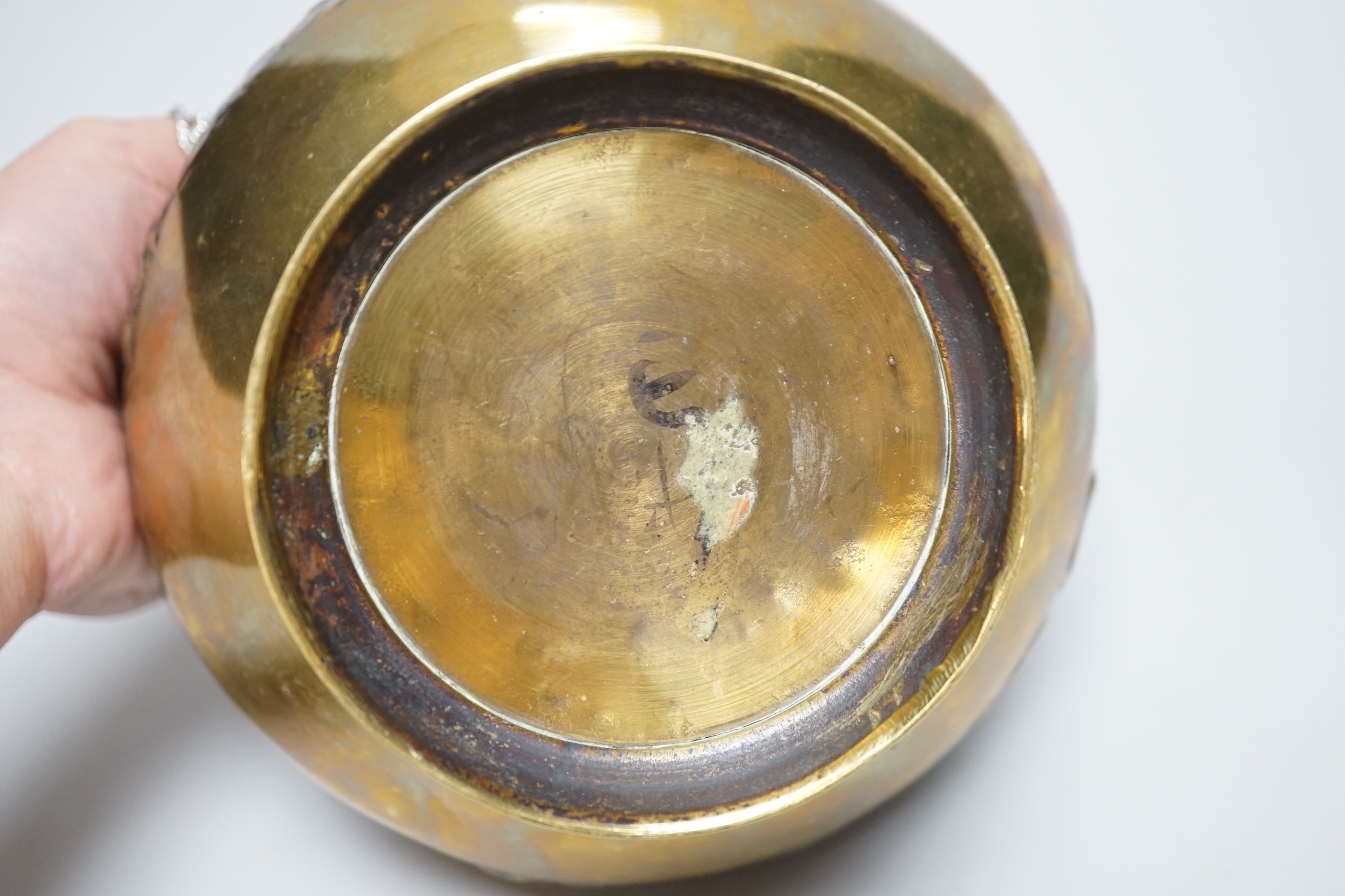 A Chinese brass bowl, 13cms high